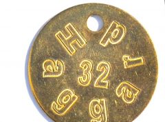 Engraved brass tag