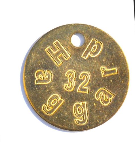 Engraved brass tag