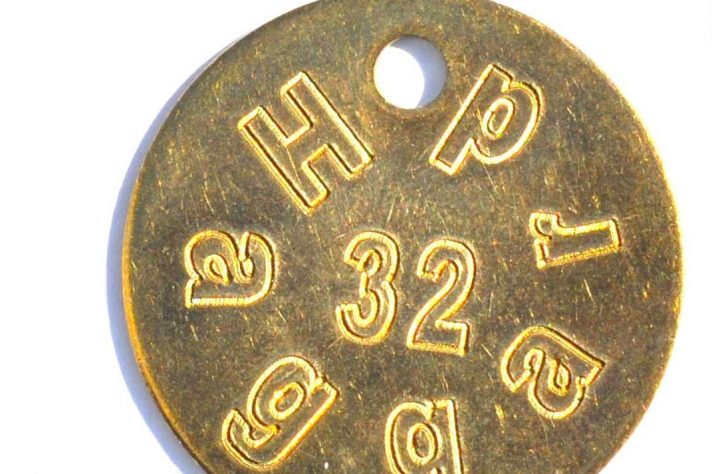 Engraved brass tag