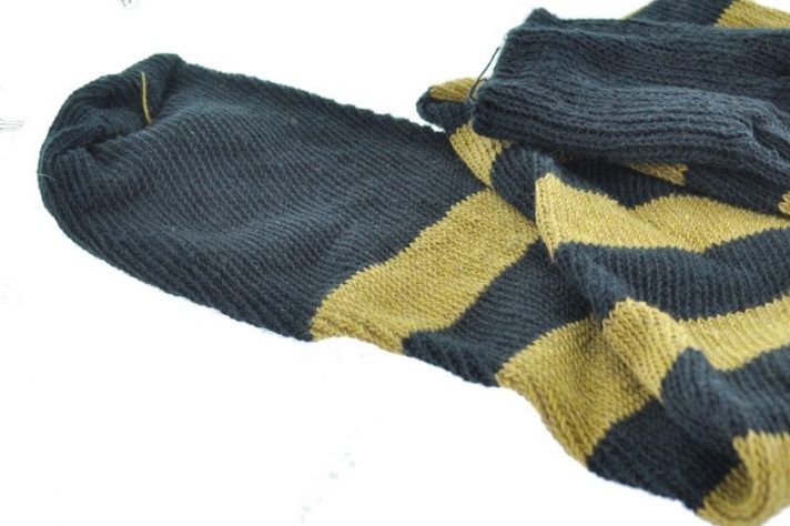 over the knee stocking black and gold