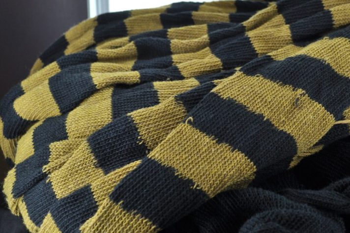 over the knee stocking black and gold